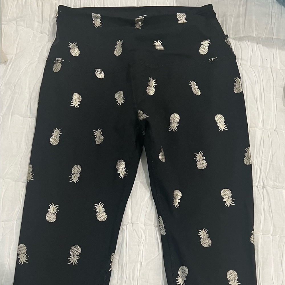 Beyond yoga. Small. Black with gold pineapple design